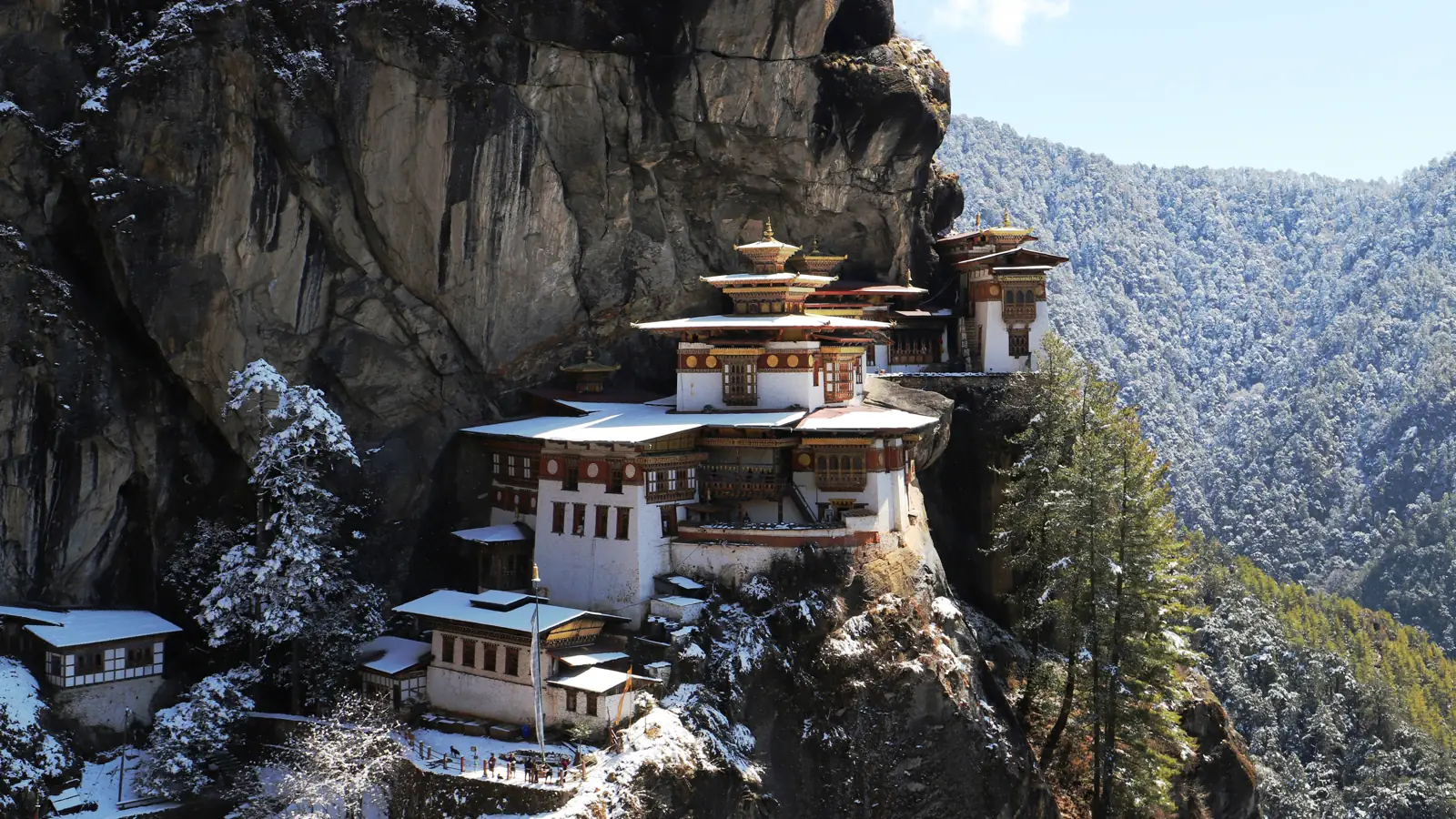 Prayer flags strung across a mountain valley in Bhutan